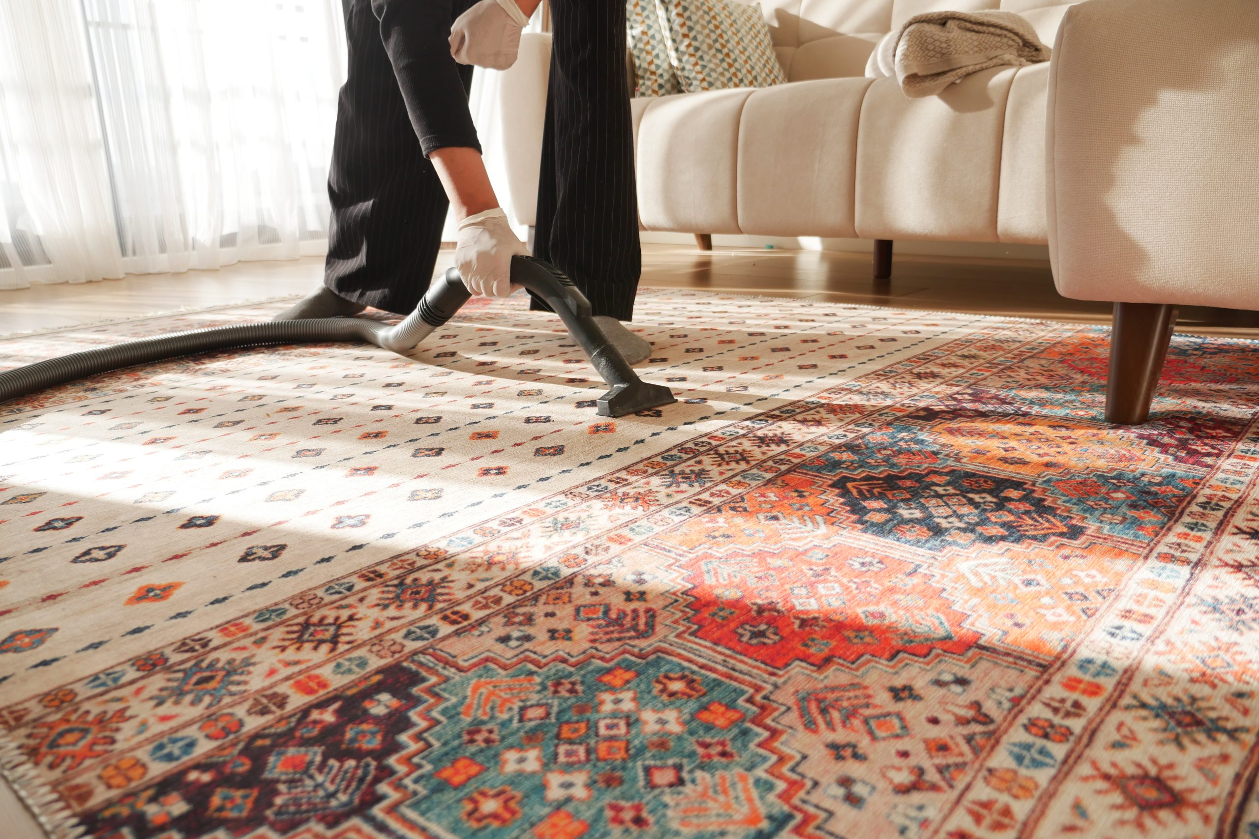 women-cleaning-with-vacuum-cleaner-carpet-2026-01-07-06-23-51-utc.jpg